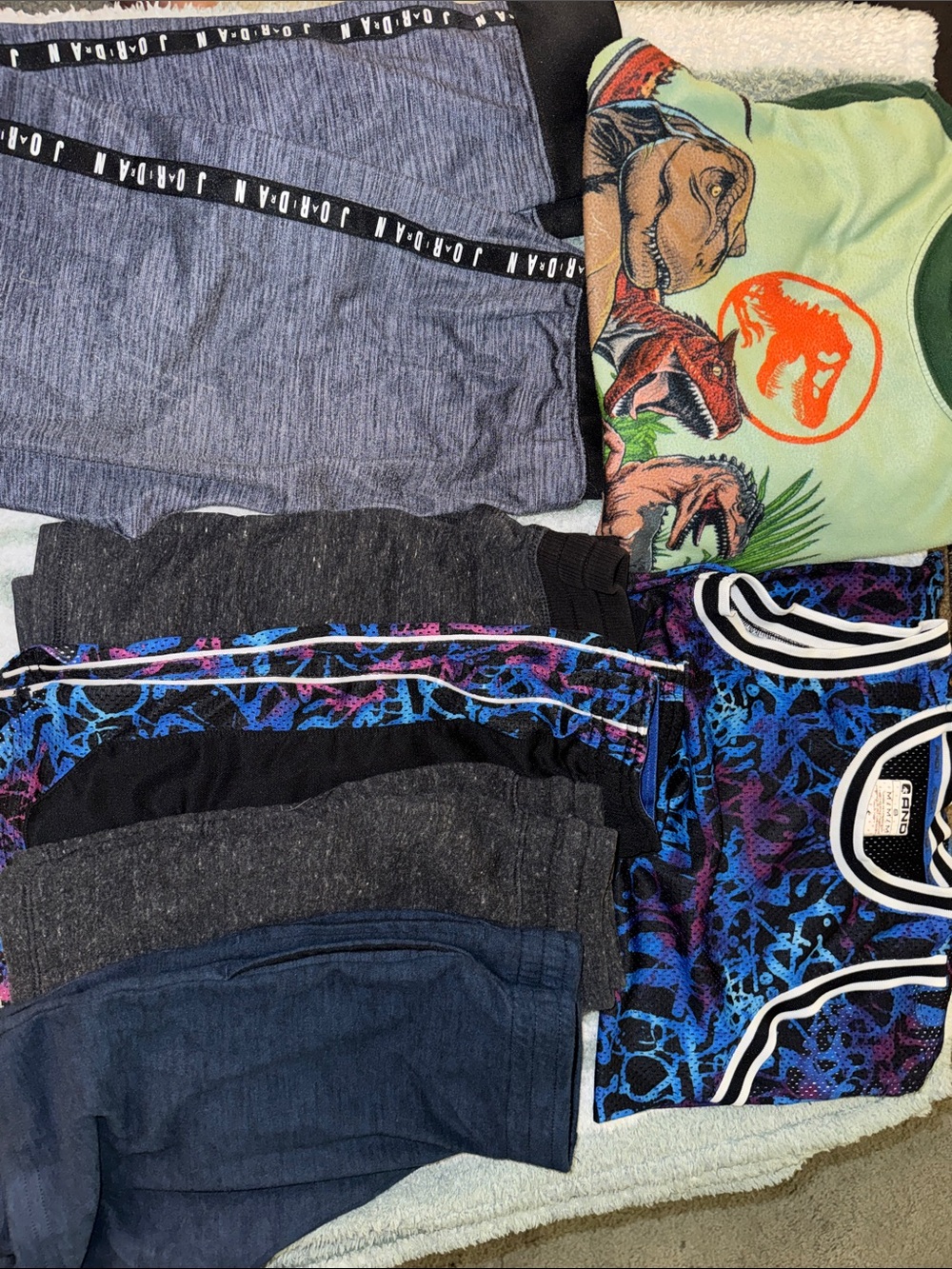 Multiple pieces of boys clothes size 8
